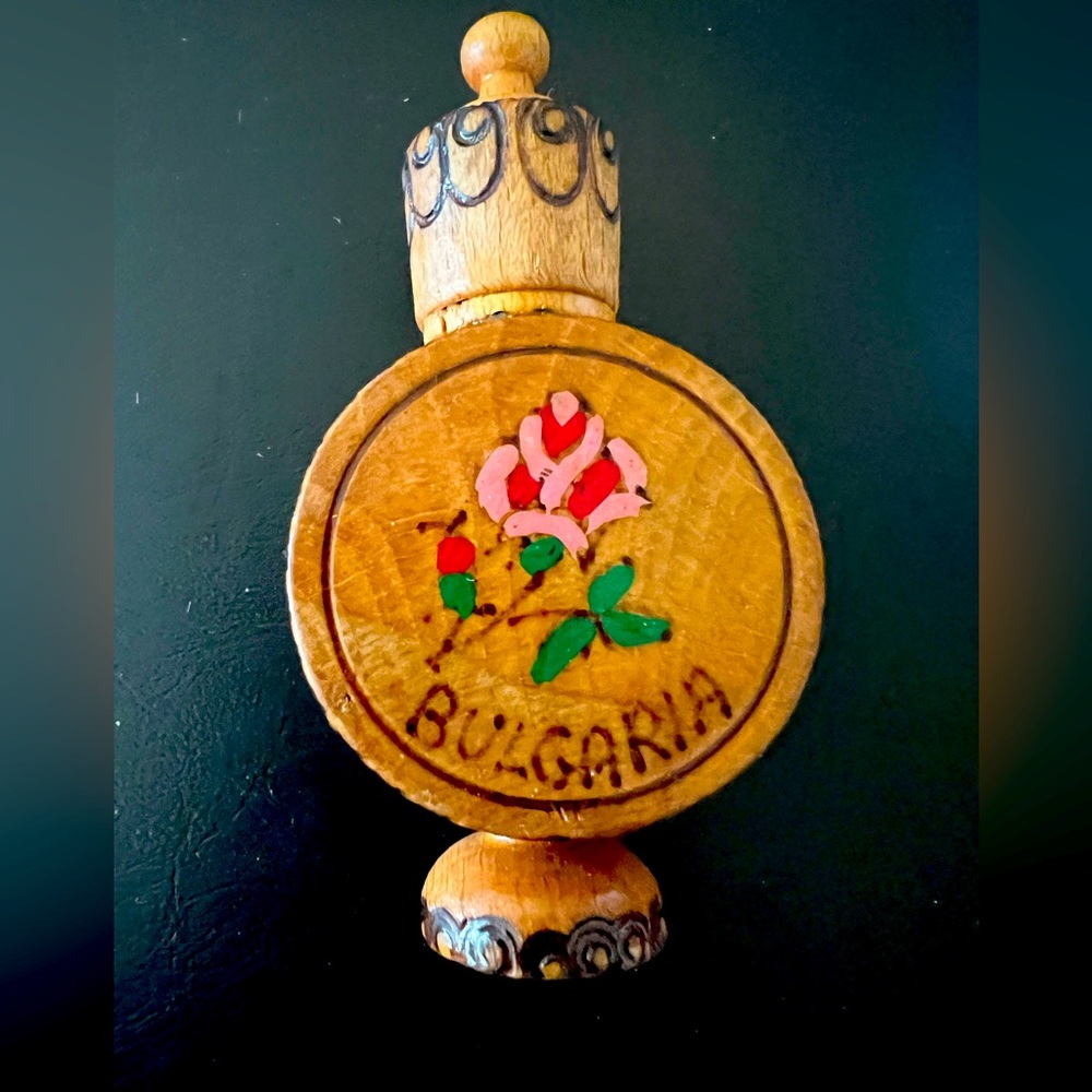Bulgaria wooden perfume bottle. Holds sample size.